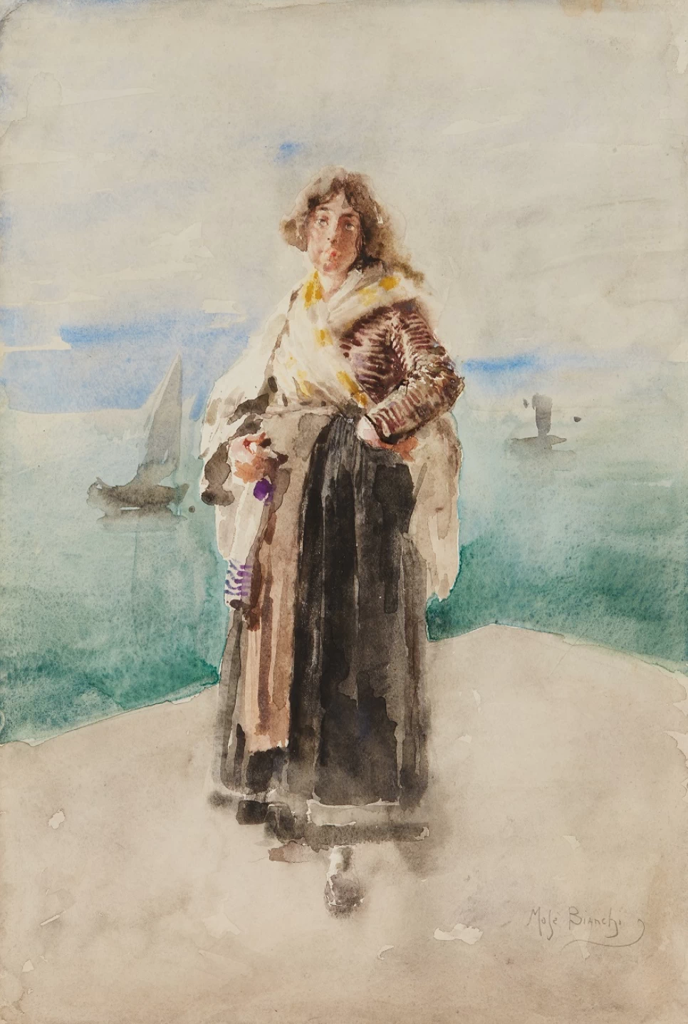Giovane donna in riva al mare